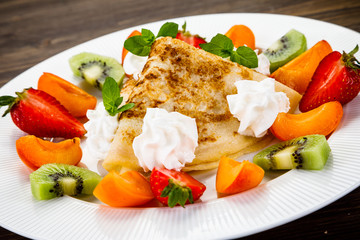 Crepes with fruit and creme