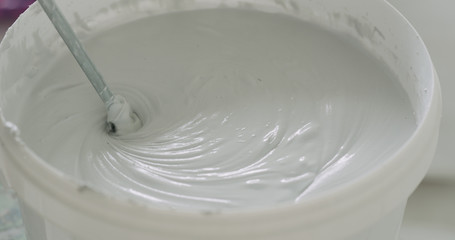 closeup mixing gray decorative concrete plaster