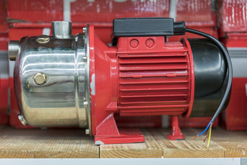 Red pump for borehole in the store