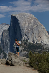 Mother with infant son visit Yosemite national park in California