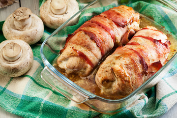 Baked chicken breast stuffed with champignon