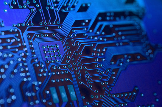close-up of electronic circuit.  electronic boards with blue light effects