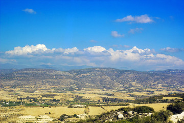 Mountains and valleys in Cyprus against blue sky