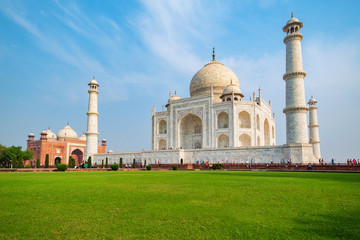Fototapeta na wymiar Taj Mahal on a sunny day. An ivory-white marble mausoleum on the south bank of the Yamuna river in Agra, Uttar Pradesh, India. One of the seven wonders of the world.