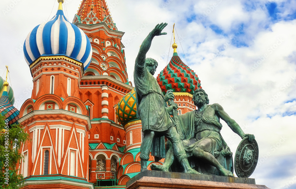 Wall mural Moscow Russia, St. Basil's Cathedral and monument to Minin and Pozharsky on the   Red square