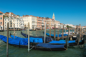Fototapeta na wymiar Passenger gondolas in the parking lot, Venice, Italy