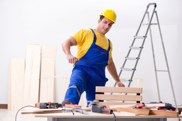 Floor repairman disappointed with his work 