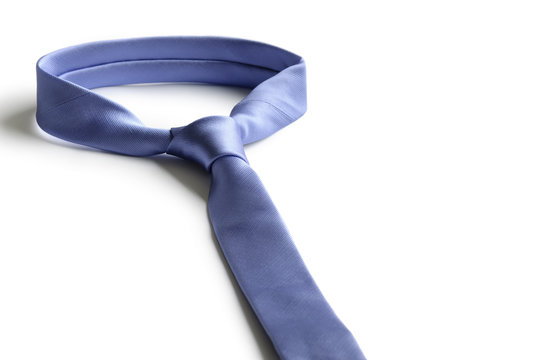 Blue neck tie isolated on white background
