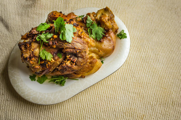 Dish with baked meat.