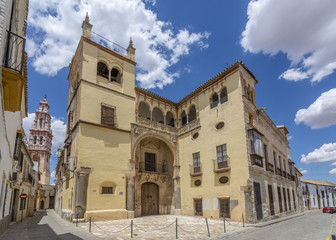 Fototapeta na wymiar Palacio de Valdehermoso con campanario iglesia de San Juan Bautista en Ecija, Sevilla