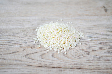 White sesame on  wooden background, Top view photo