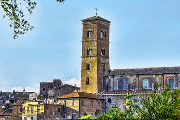 Cityscape of the ancient village of Sutri and the bell tower of  Holy Mary Assumption s Co-Cathedral  - Sutri , Italy