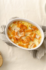 Roasted squash baked with heavy cream, thyme, white wine and parmesan cheese