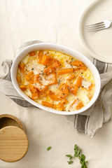 Roasted squash baked with heavy cream, thyme, white wine and parmesan cheese