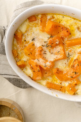 Roasted squash baked with heavy cream, thyme, white wine and parmesan cheese