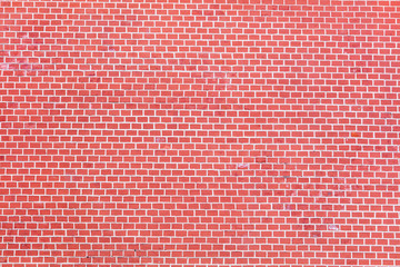 Fototapeta na wymiar Cobbles of red brick as an abstract background