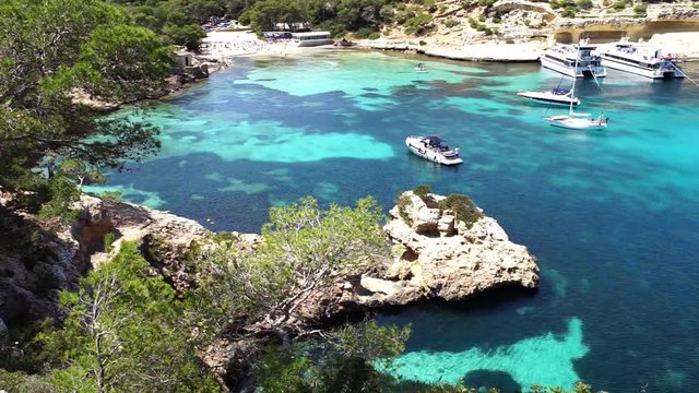 Idyllic view of bay with luxury boats at Portals Vells bay, beautiful beach on Majorca island, Spain Mediterranean Sea