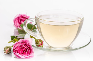 Glass cup of Tea with roses
