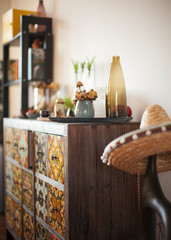 decoration on ancient vintage old commode chest of drawers. Hand made craft gifts and candels. Selective focus