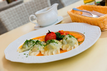 Delicious hot homemade dumplings with mashed potato and meat