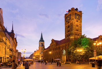 Torun Town Hall and monument of Copernicus at night