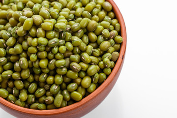 fresh muung beans on a white background
