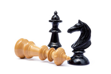 Old chess pieces isolated on white background