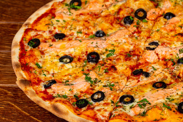 Pizza with salmon