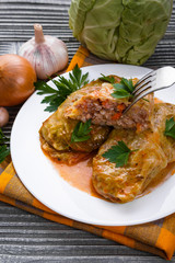 cabbage rolls on a wooden gray rustic background