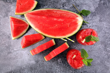 Tasty fresh appetizing watermelon drink smoothie. Watermelon drink in glasses with slices