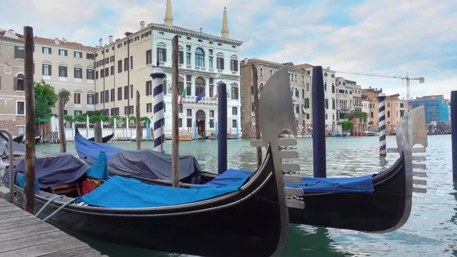 View of The Grand Canal in Venice with moored gondolas, Italy 