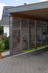 modern entrance area and garage in suburban street
