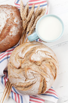 Homemade crusty bread and milk