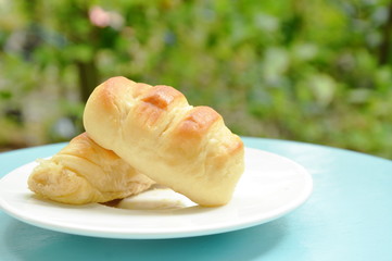 bread stuffed pork sausage on white dish