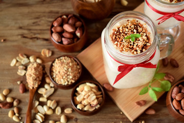 Protein cocktail with peanuts in a glass jar