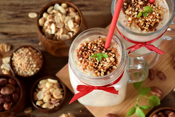Protein cocktail with peanuts in a glass jar