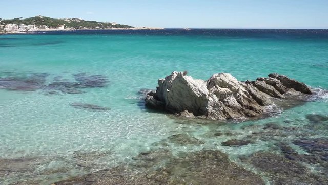 Idyllic sea view at seaside of Son Moll beach with soft waves at coast of Cala Ratjada, Mallorca island, Spain Mediterranean Sea