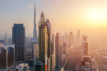 Naklejka premium Dubai in sunset time, United Arab Emirates