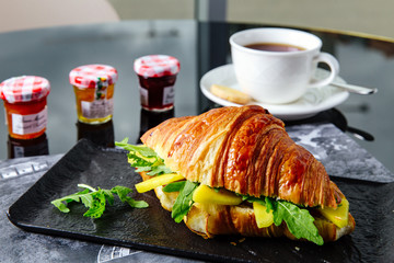 Croissant with cheese and herbs