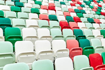 Obraz premium colored chairs at a football stadium