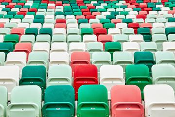 Fototapeta premium colored chairs at a football stadium