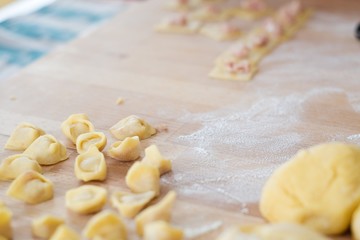tortellini homemade laid on cutting board