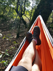 Camper relaxed in hammock - 210556946