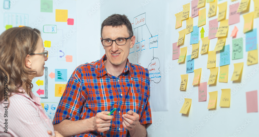 Poster creative developers of applications are working on a new web design.