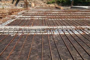 Construction of a new building, binding of reinforcement