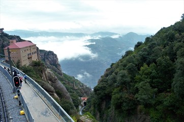 An hour train ride away from Barcelona, Spain is this beautiful mountain range called "Montserrat".  The views are spectacular, it's worth visiting even on a cloudy and rainy day.