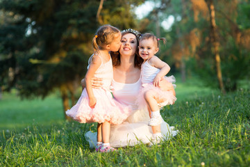 Naklejka premium mom and two daughters