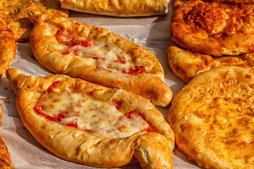 khachapuri with cheese and egg on a plate