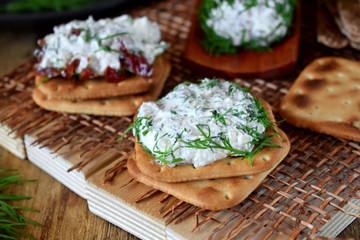 Canape made of crackers with forshmak. Cold snack