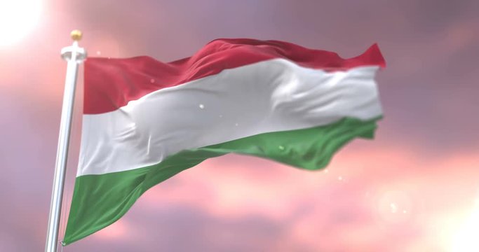 Flag of Hungary waving at wind in slow at sunset, loop